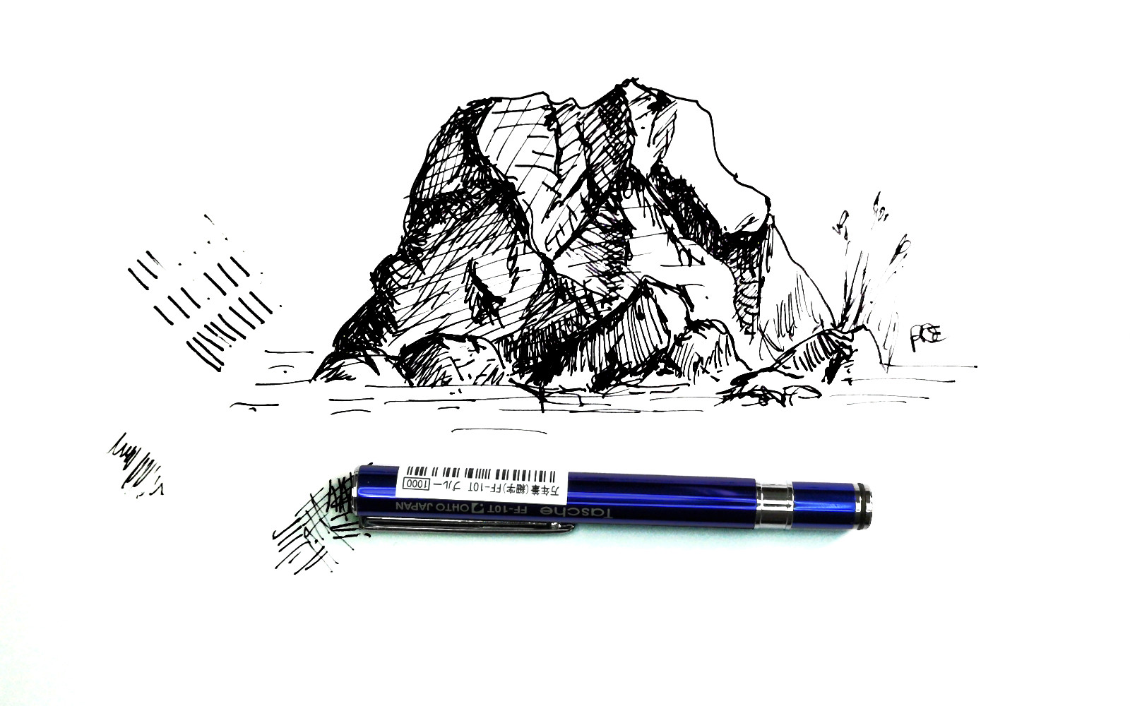 Rock doodled with the Ohto Tasche fountain pen